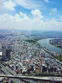 High angle view of modern buildings against sky in city