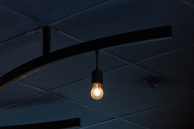 Low angle view of illuminated light bulb