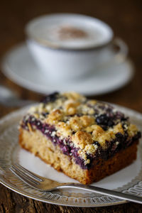 Close-up of cake with coffee