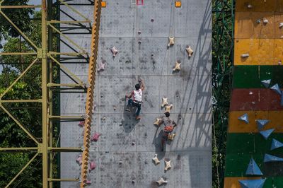 High angle view of people walking on street