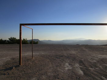 Scenic view of landscape against clear blue sky