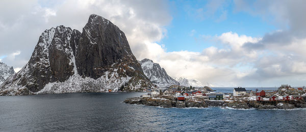 Panoramic view of rocks and sea against sky