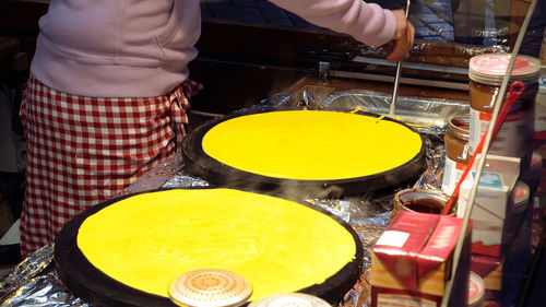 Close-up of man preparing food