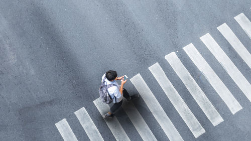 High angle view of woman on road