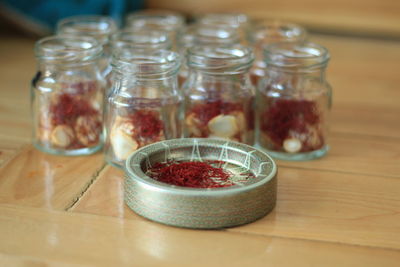 Close-up of drink in glass jar on table