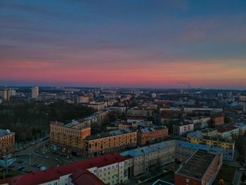 High angle view of townscape against sky during sunset