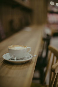 Close-up of cappuccino on table