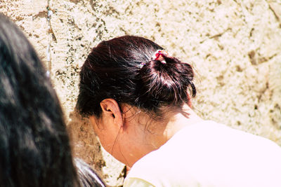 High angle view of woman on wall