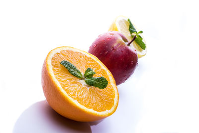 Close-up of fruits on white background