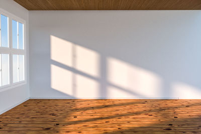 Sunlight falling on wall at home