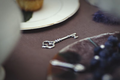 Close-up of guitar on table