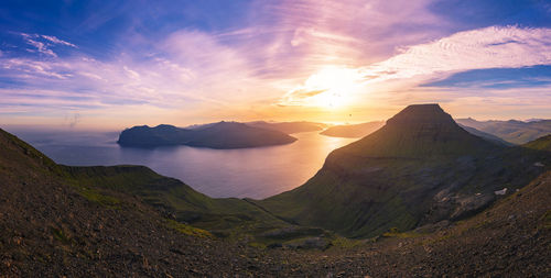 Scenic view of mountains against sky during sunset