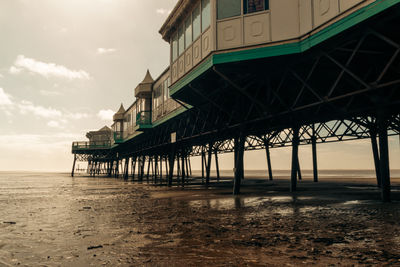 Pier over sea against sky