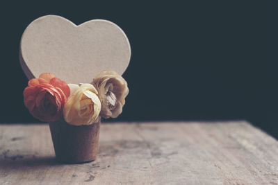 Close-up of rose on table