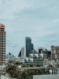 Modern buildings in city against sky