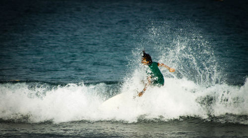 Man surfing in sea