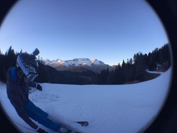 View of landscape against clear blue sky