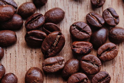 Close-up of coffee beans on table