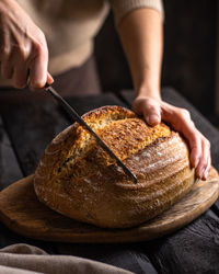 Midsection of man preparing food