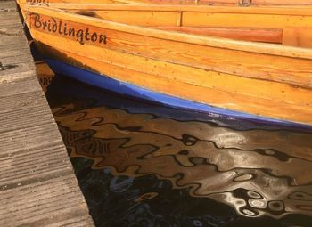 High angle view of boat on wood