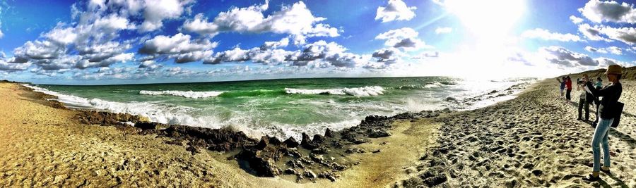 Panoramic view of beach against sky