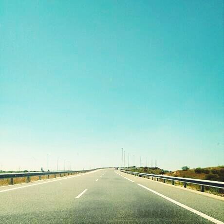 the way forward, road, transportation, road marking, diminishing perspective, clear sky, vanishing point, copy space, asphalt, empty road, country road, empty, blue, long, highway, street, dividing line, outdoors, connection, no people