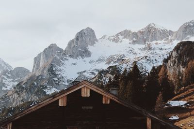 Scenic view of snow covered mountains against sky