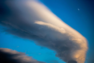 Low angle view of clouds in blue sky