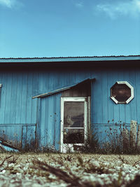 House on field against sky