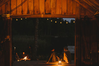Panoramic view of illuminated fire at night