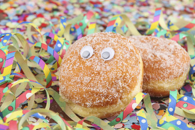 Close-up of donuts on confetti