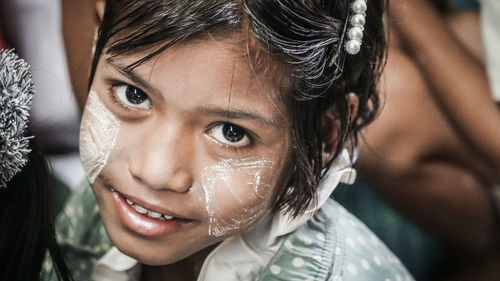 Portrait of young girl with face paint