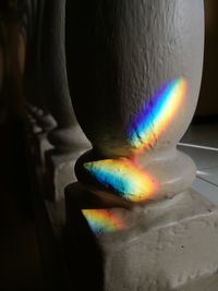 Close-up of rainbow on table