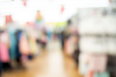 Defocused image of people at store