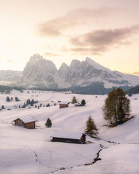 Scenic view of snowcapped mountains against sky during winter