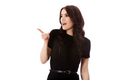 Portrait of a smiling young woman over white background