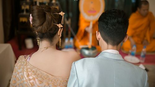 Rear view of couple at wedding