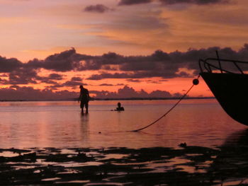 Scenic view of sea at sunset