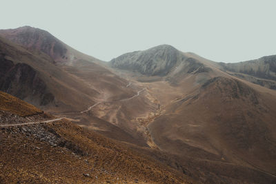 Road through the mountains and clouds