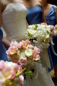 Close-up of rose holding bouquet