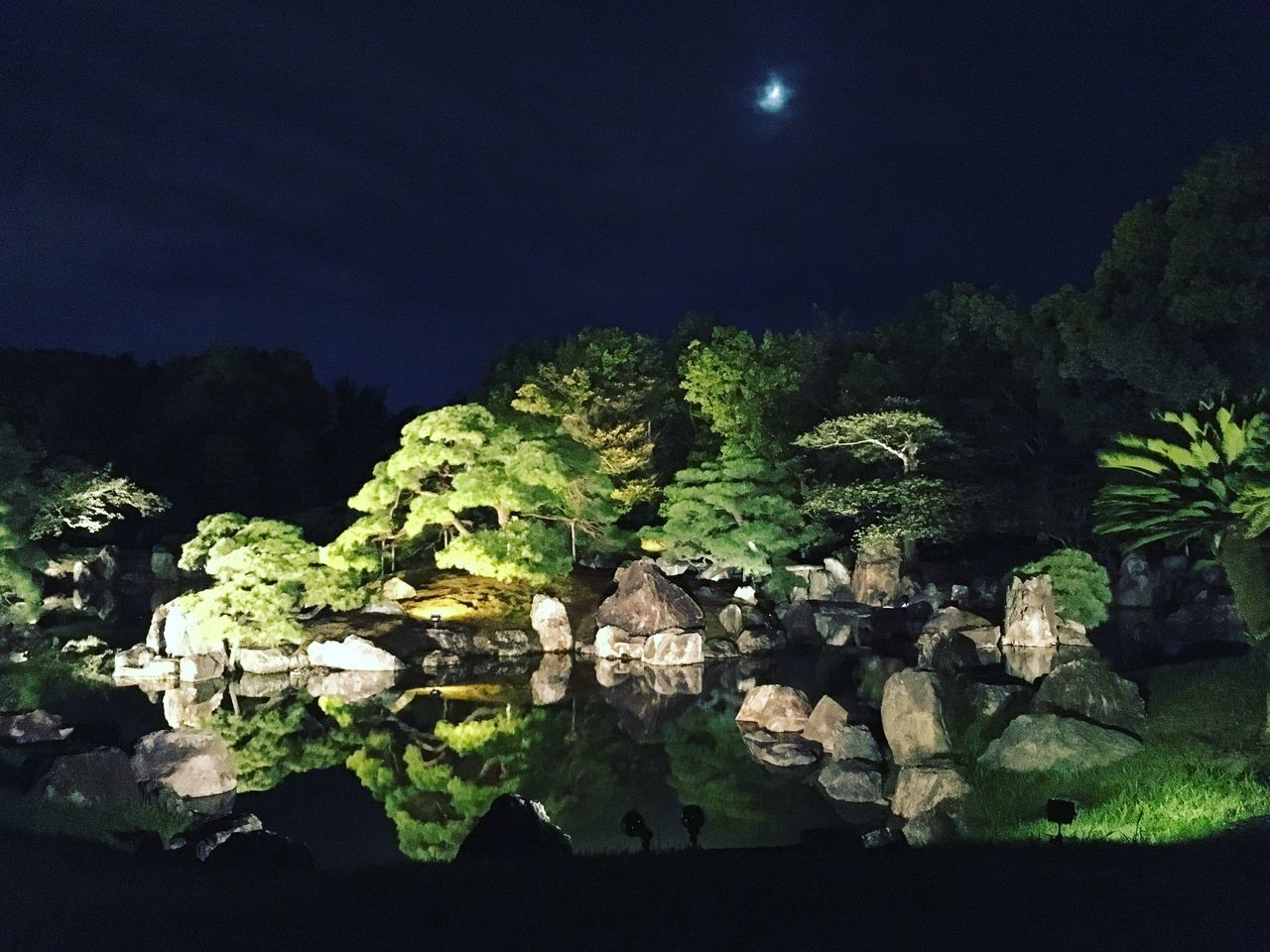 night, illuminated, scenics, tranquility, tranquil scene, beauty in nature, dark, non-urban scene, sky, nature, tourism, rock formation, no people, majestic, fragility, ancient, history