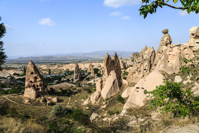 Panoramic view of rock formations against sky