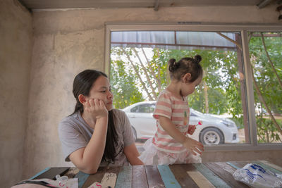 Friends sitting outdoors