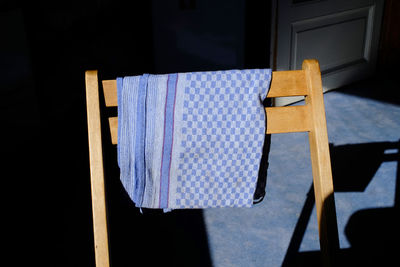 Close-up of napkin on chair