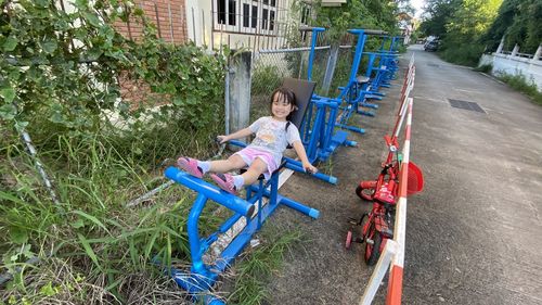 Portrait of smiling woman riding motorcycle