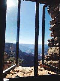 Scenic view of sea seen through window