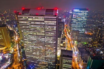 High angle view of illuminated buildings at night