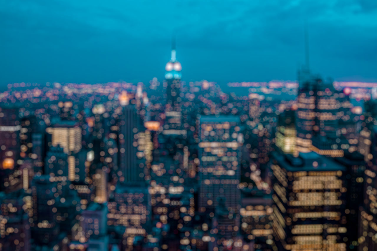 HIGH ANGLE VIEW OF CITY BUILDINGS AGAINST SKY