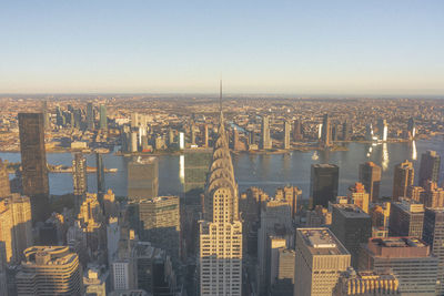 Aerial view of cityscape against clear sky