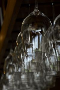 Close-up of glass light on table